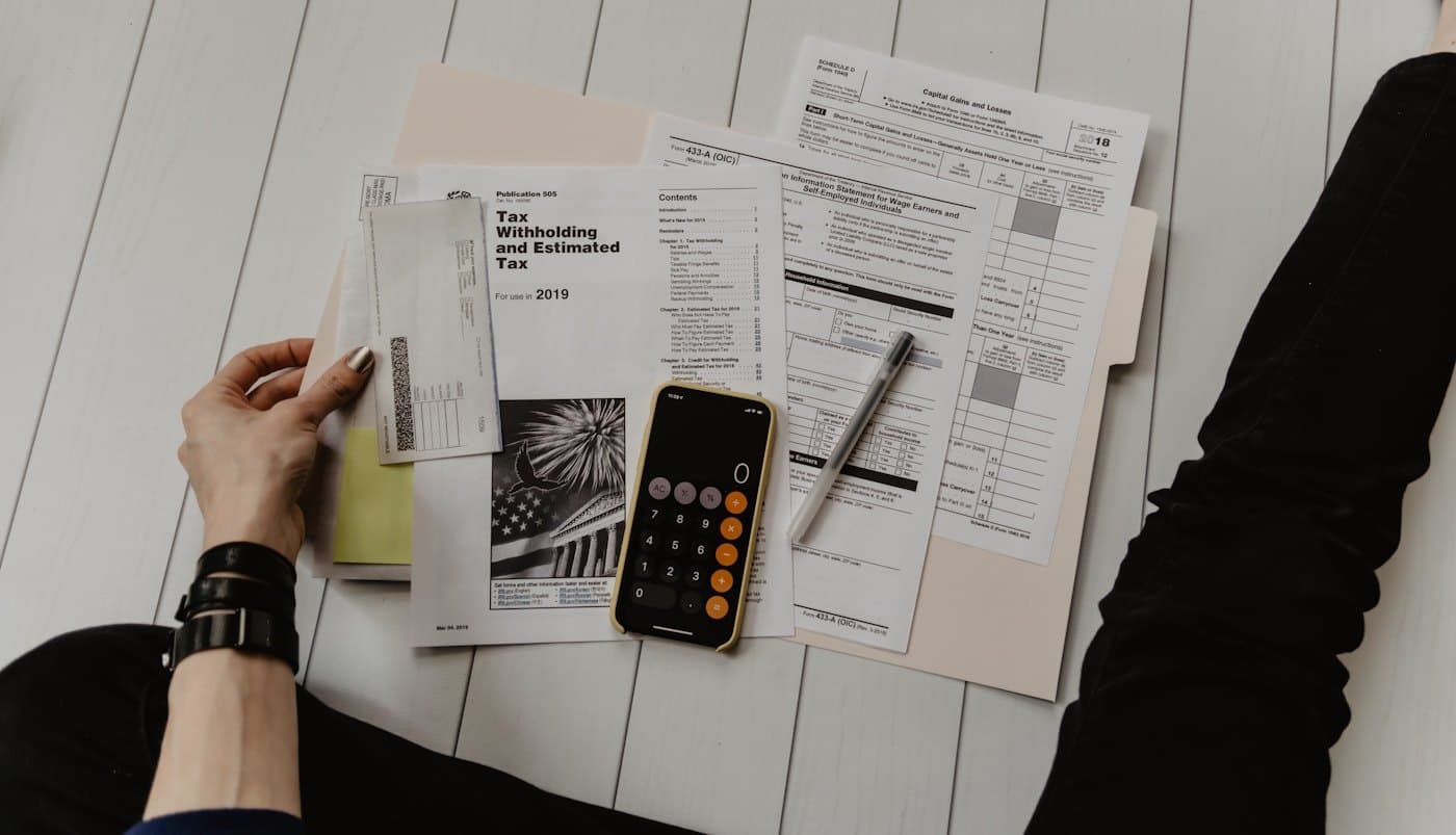 Advisors reviewing financial statements together at a desk